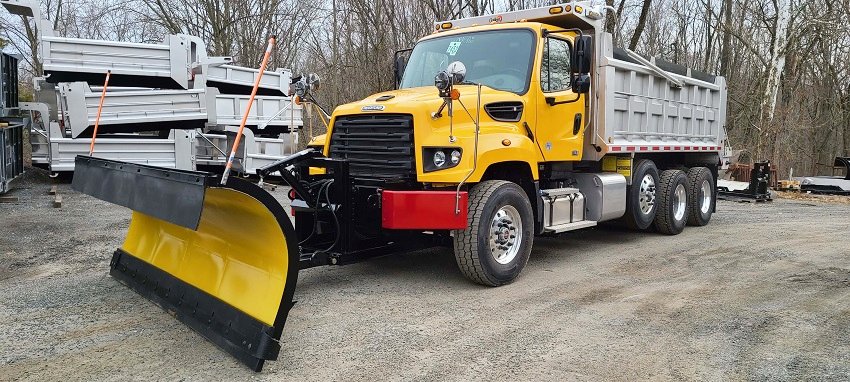 Freightliner Tri-Axle Dump with Galion/Godwin body, Force America hydraulics, Valk snowplow, and Swenson salt spreader.