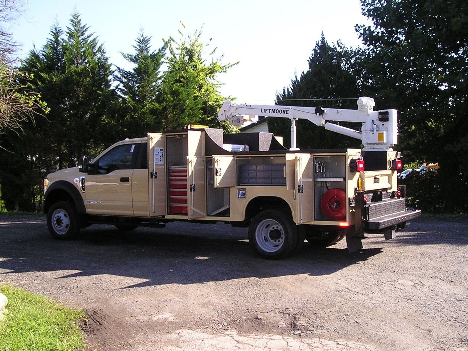 F-550 Crane Truck with Knapheide Service Body, Liftmoore Crane, and Vanair 300 Diesel.