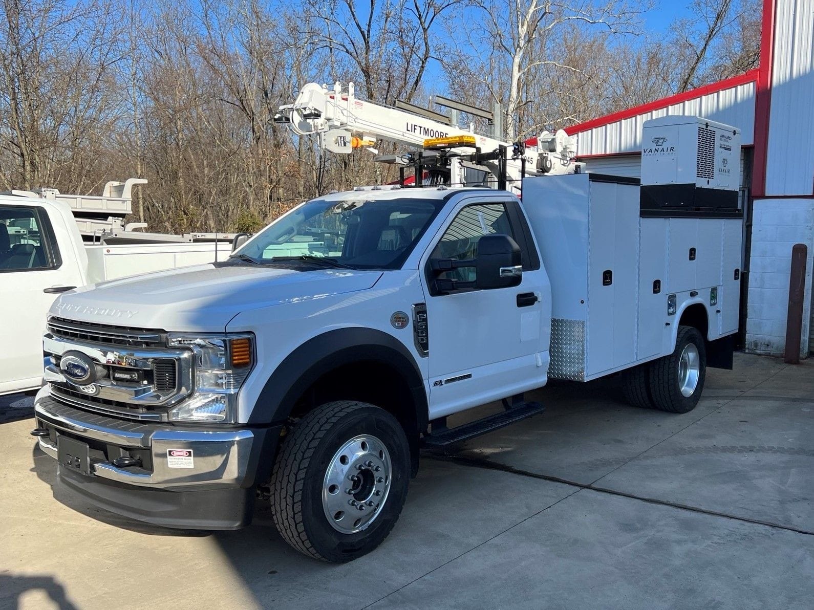 F-600 Crane Truck  with Knapheide service body, Liftmoore Crane, and Vanair 300 diesel.